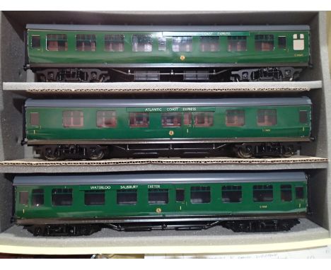 Ace Trains O gauge, three coach set A, BR MK1, Green in excellent condition, Atlantic Coast Express roof boards, box has stor