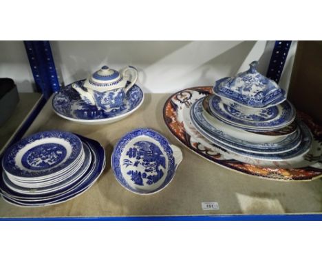 SHELF OF BLUE & WHITE LARGE PLATES