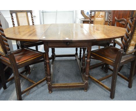 A good large oak drop-leaf gate-leg dining table.