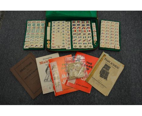A travelling Mahjong set and other items.