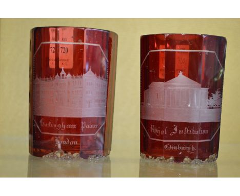 A pair of ruby tinted cut glass Spa beakers.
