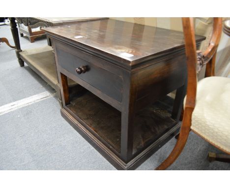 An oak single drawer two tier lamp table.
