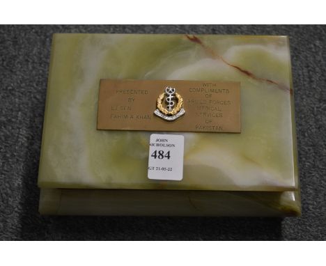 An alabaster cigarette box with Army Medical Services logo.