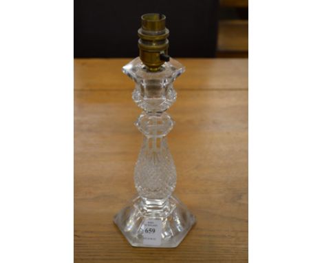 A small cut glass table lamp.