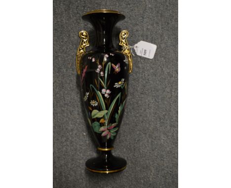 An enamel decorated twin handled vase.
