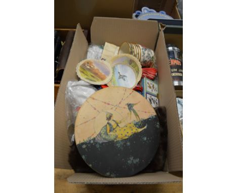 A decorative box containing painted silk work pictures together with other textiles etc.