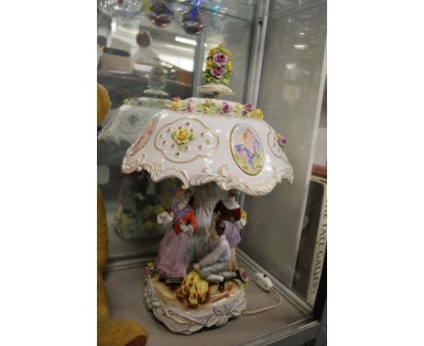 A large Capodimonte figural lamp.