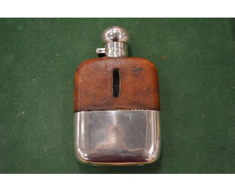 A silver plated and leather hip flask with captive top, James Dixon &amp; Sons.