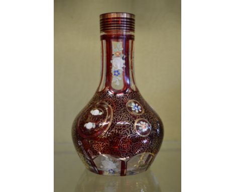 A ruby tinted and enamel decorated glass hookah base.