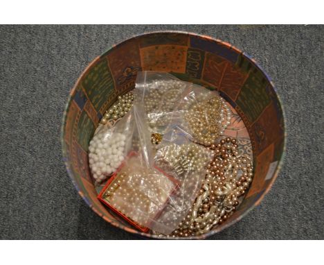 A quantity of pearl necklaces etc.
