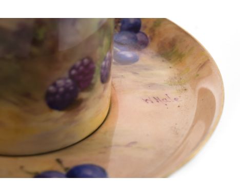ROYAL WORCESTER CABINET COFFEE CAN AND SAUCERboth painted with fruits on naturalistic ground, with gilt highlights, the sauce