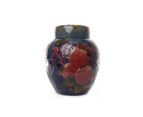 CONTEMPORARY MOORCROFT 'BLUE FINCHES' PATTERN LIDDED JARof oviform, decorated with tube-lined birds and fruits on blue ground