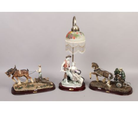 A Leonardo collection figural table lamp, along with two Leonardo collection farming figure groups.