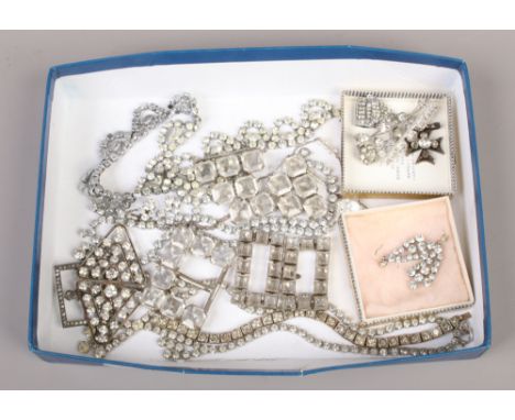 A tray of vintage white paste costume jewellery.