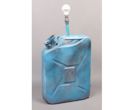 A jerry can converted to a table lamp and painted with the Volkswagon logo.