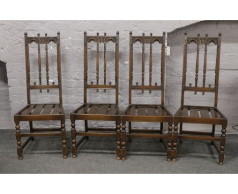 A set of four Ercol Old Colonial high back dining chairs.