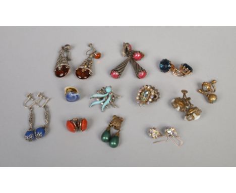 Twelve pairs of vintage costume jewellery earrings including clip on and screw back.