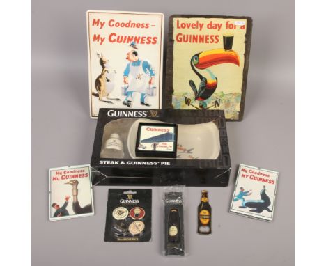 A collection of Guinness advertising memorabilia including pie dish and funnel, magnetic bottle opener and enamel sign etc.