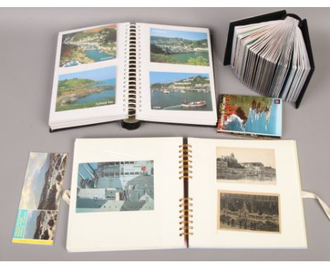 Three albums of postcards including some vintage monochrome.
