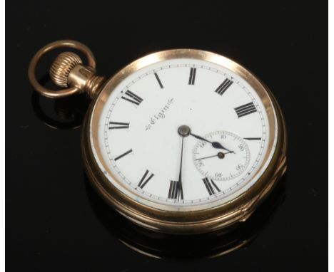 An Elgin pocket watch in rolled gold case with enamel dial and subsidiary seconds.