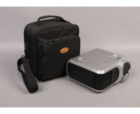 A cased digital Acer PD1005 projector by Texas Instruments.