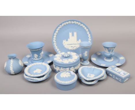 A collection of blue Wedgwood Jasperware to include trinket boxes, dishes, vases, cabinet plates etc.