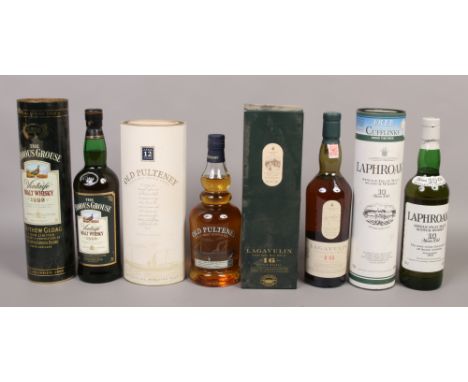 Lagavulin single islay malt Whisky 16 years 70cl, Laphroaig 10 years 70cl, The Famous Grouse vintage malt Whisky 1992 70cl an