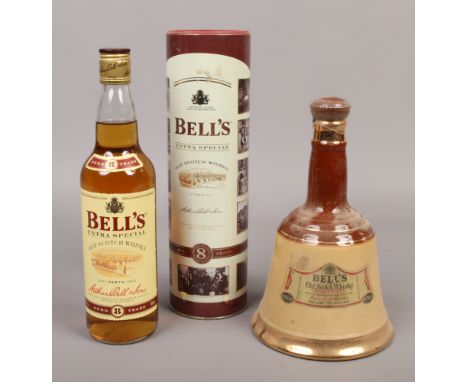 Bells extra special old Scotch Whisky 8 years, 70cl boxed and a Wade Bells Scotch Whisky decanter 26 2/3 fl oz.