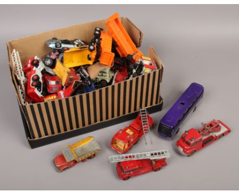 A box of Matchbox and Dinky Diecast toy vehicles to include vintage examples.