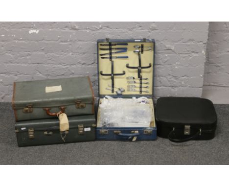 A vintage Brexton picnic set and three vintage cases.