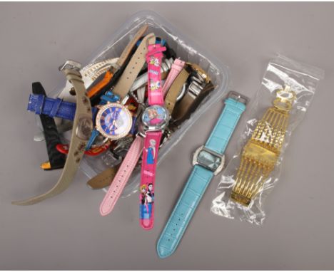 A box of wristwatches mainly quartz to include manual Oris example.