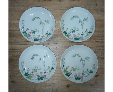 Four Chinese porcelain saucers, circa 1900, three with four character mark to base, diameter 13.5cm. Condition - one with imp