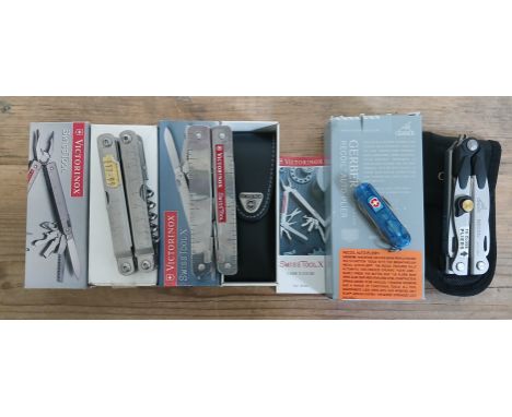 A group of six multi-tools comprising Victorinox SwissTool and SWissTool X, a Gerber Recoil Auto-Plier, two Naiticalias and a