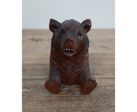 A Black Forest carved bear inkwell, height 9.5cm.