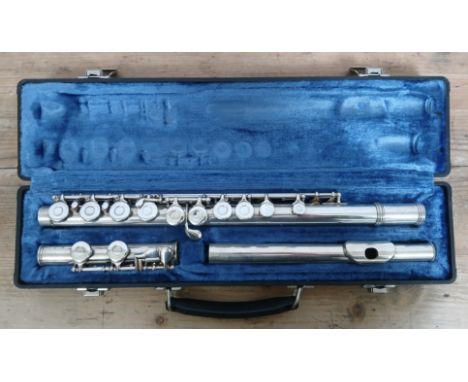 A Gemeinhardt Elkhart silver plated flute with hard case.