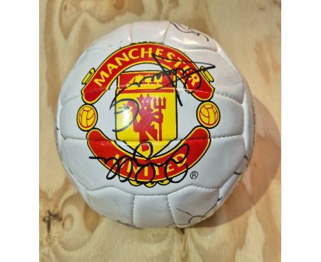 A signed Manchester United football, 2001.