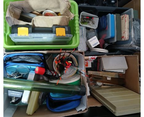Four boxes of assorted fishing tackle including flies and fly making equipment and tools, floats, rod tips, spools, weights e