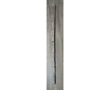 An African fishing spear with barbed metal spearhead, length 125cm.