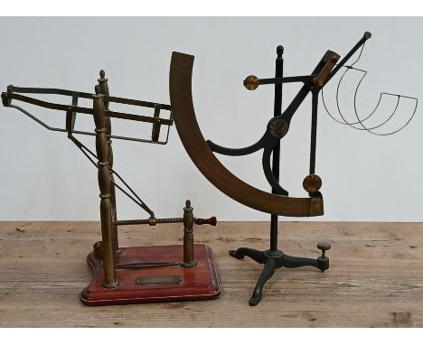 An early 20th century balance scale by H.E. Messmer, London, together with a mechanical wine pourer.