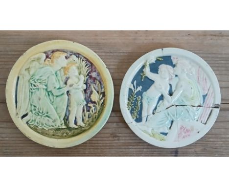 Two Della Robbia plaques depicting classical scenes, impressed marks verso, diameter 10.5cm & 11.5cm.Condition - the smaller 