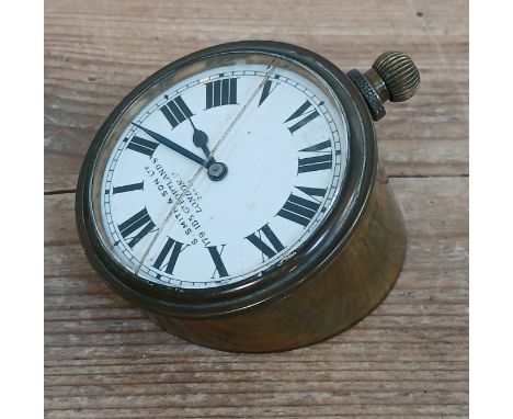 A vintage brass Veteran car dashboard clock by 'S. Smith &amp; Son Ltd... London', diameter 7cm.