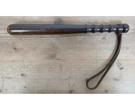 A rosewood truncheon, stamped 'J Fyzack & Son Sheffield', length 38cm.Condition:- General wear only, no sign of any cracks, s