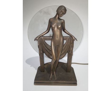 A modern Art Deco style composite table lamp, height 33cm.
