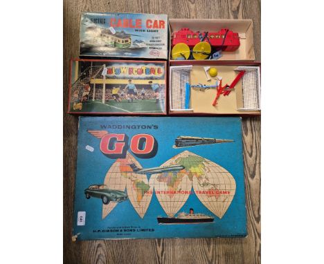 A mixed lot of 1970s toys and games including Berick Games 'Blow Football' (complete), Cosmo battery operated electric cable 