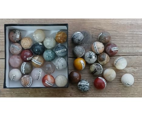 A collection of hard stone mineral marbles, diameter approximately 20mm each.