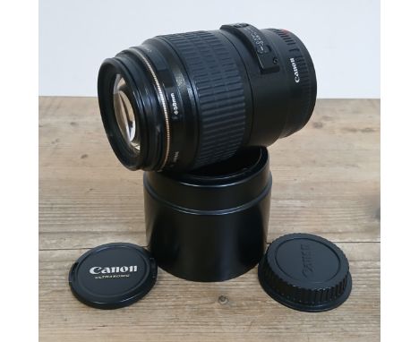 A Canon macro lens EF 100mm 1:2.8Condition:- Light general wear, appears to be no matter under both glass  ends, no notable s