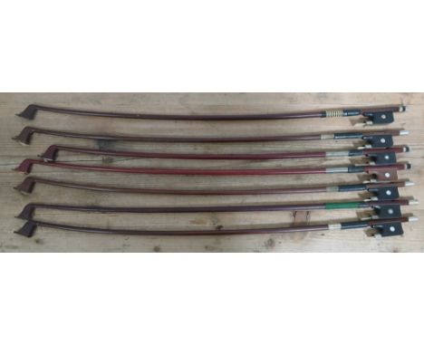 A group of seven assorted cello bows including one stamped 'Pendler'.