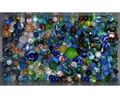 A box of assorted mainly glass marbles, various designs and sizes.