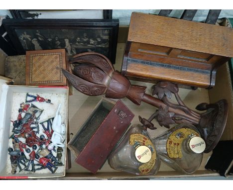 A box of assorted collectables including treen, whisky bottles, easel, piano, lead figures etc.