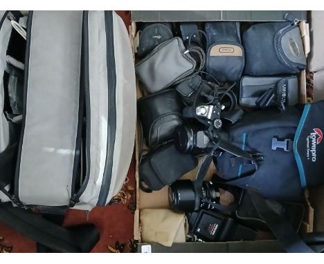 A box and bag of various cameras and accessories including digital compact cameras, lenses etc.